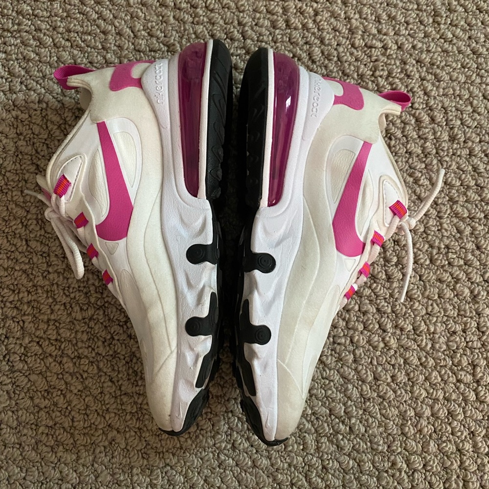 Pink and white Nike air max